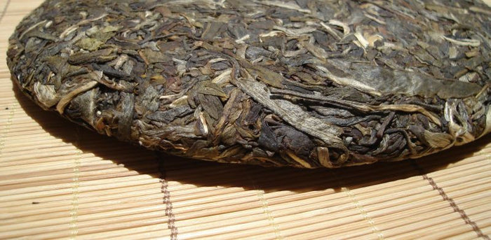 2007 Guoyan "Star of Yi Wu" Raw Pu-erh Tea * 357 grams | Yunnan Sourcing Tea Shop