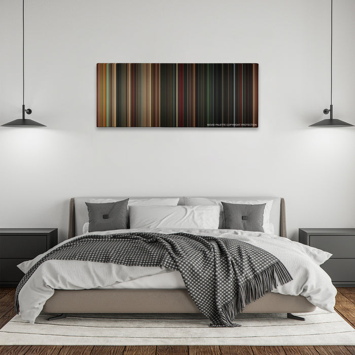 Angels & Demons color palette canvas above a bed, between two black pendant lamps