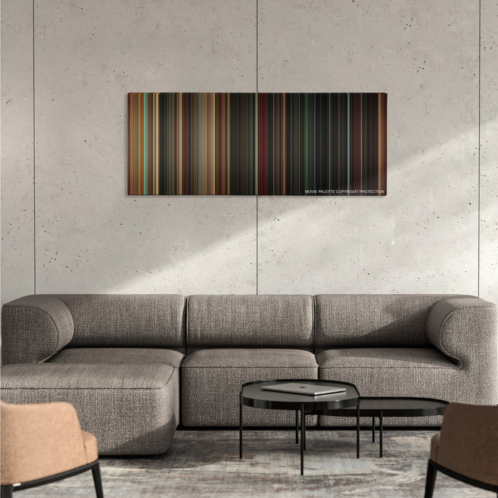 Angels & Demons color palette canvas on a concrete wall above a gray sectional sofa
