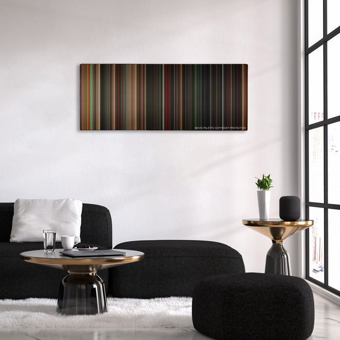 Angels & Demons color palette canvas above a black sofa with a gold-topped table