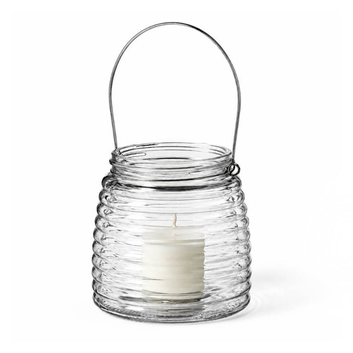 White votive candle in a 4.6" Hanging Horizontal Ribbed Glass Jar with Handle