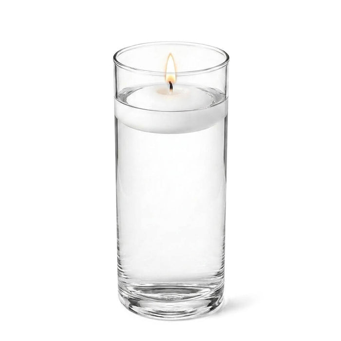 Clear 3.25"x9" cylinder vase with a lit floating candle