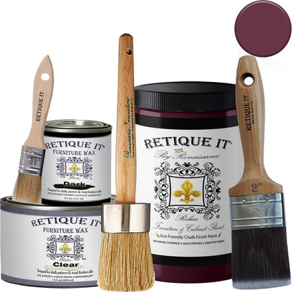 Retique It furniture and cabinet paint in quart size, plum color with a smooth finish and a paintbrush showing on the surface.