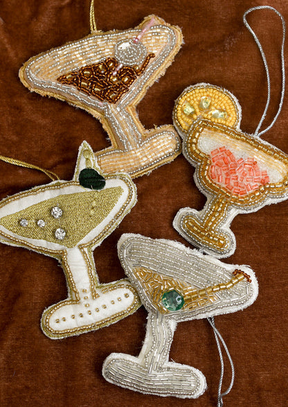 Decorative Christmas ornaments shaped like cocktail glasses.