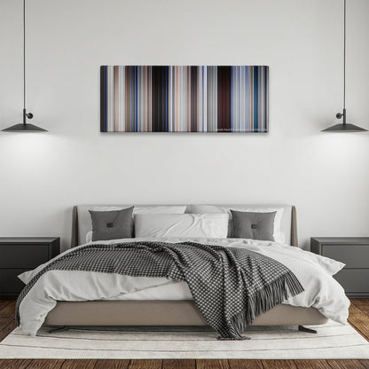Jaws color palette canvas above a bed, between two black pendant lamps