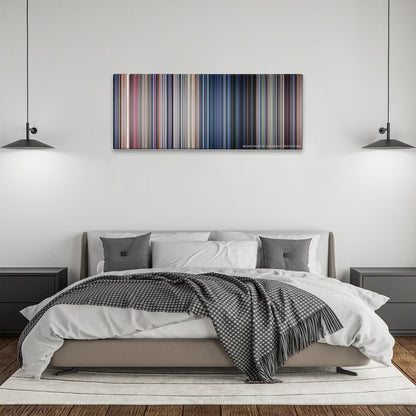 Jurassic Park color palette canvas above a bed, between two black pendant lamps