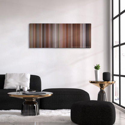 Liar Liar color palette canvas above a black sofa with a gold-topped table