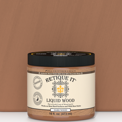 Dark Liquid Wood paint by Retique It for interior wood surfaces, shown in a sleek, smooth application on a finished wood panel.