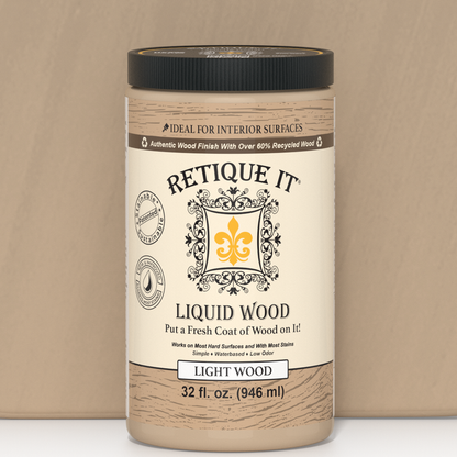 Retique It Liquid Wood 32oz Light interior paint in a clear bottle showing the light-colored liquid for wood finish.