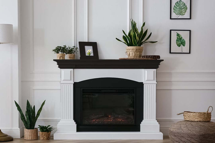 Retique It Multi-purpose Smooth Finish Kit (Large) in classic black applied to a fireplace mantle for a sleek interior top coat.