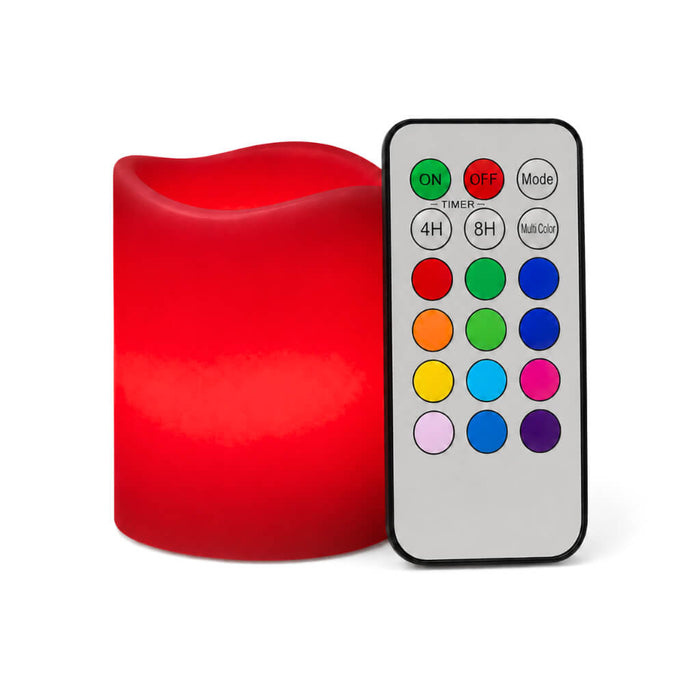 Small red LED pillar candle with remote on white background