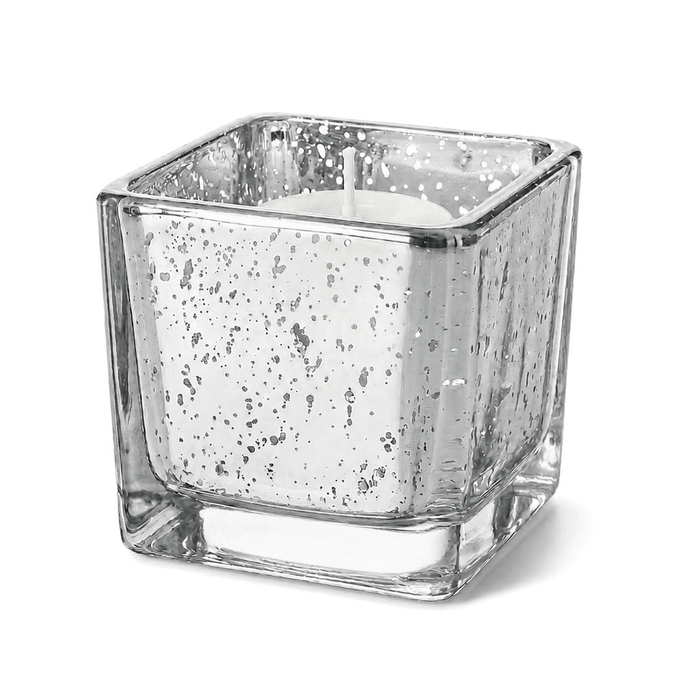 Silver mercury square votive holder with candle on white background